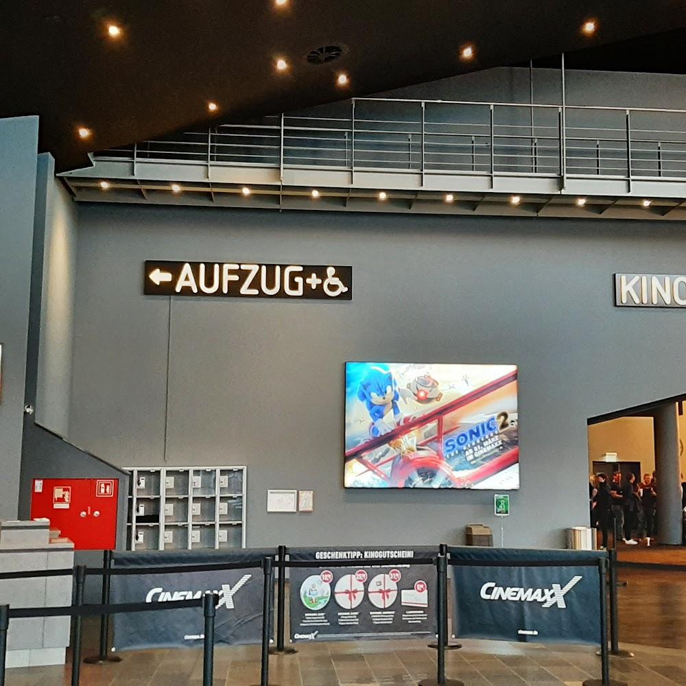 A movie theater lobby with a Sonic the Hedgehog 2 poster.
